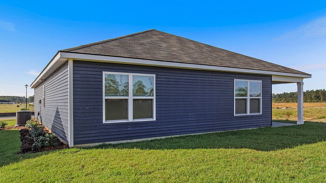 Exterior details and patio area of a home in Auberon Woods, Conway (Image 3).