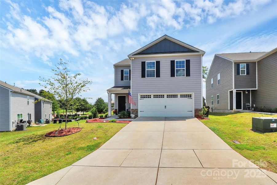 Front exterior of a new home in Abrial Ridge, York, SC, highlighting curb appeal (Image 21).