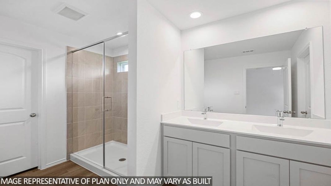 Furnished interior view inside a new home in Sunterra, Katy (Image 8).