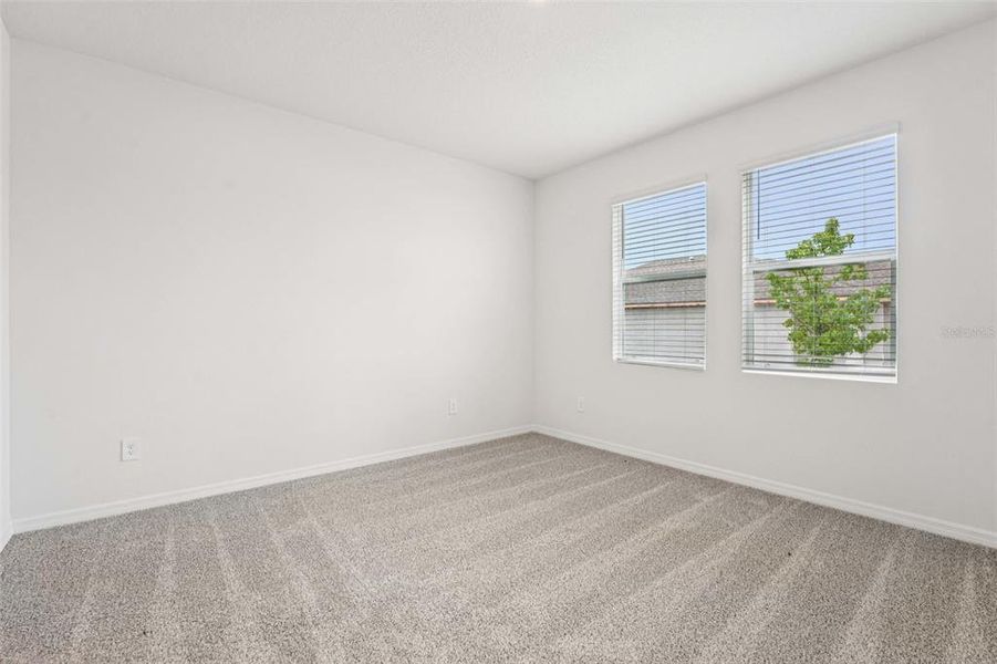 Spacious, unfurnished interior of a new home in The Grove at Stuart Crossing - Premier Series, Bartow (Image 20). Spacious, unfurnished interior of a new home in The Grove at Stuart Crossing - Premier Series, Bartow (Image 20).