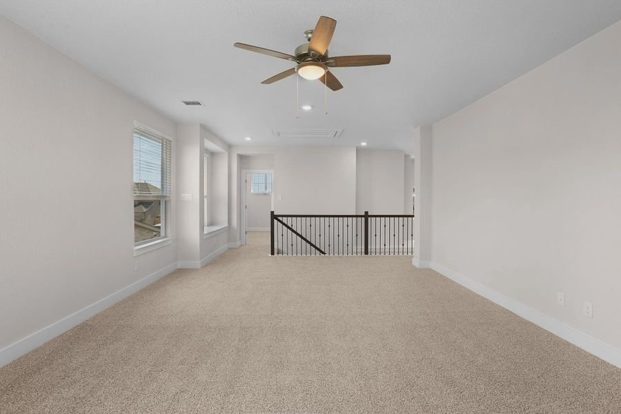 Representative unfurnished interior of a home built from the Archer by Chesmar Homes in Lariat, Liberty Hill (Image 27).