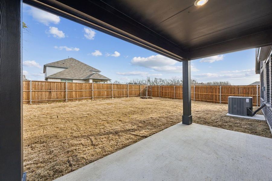 The covered back patio is perfect for a relaxing spring evening!