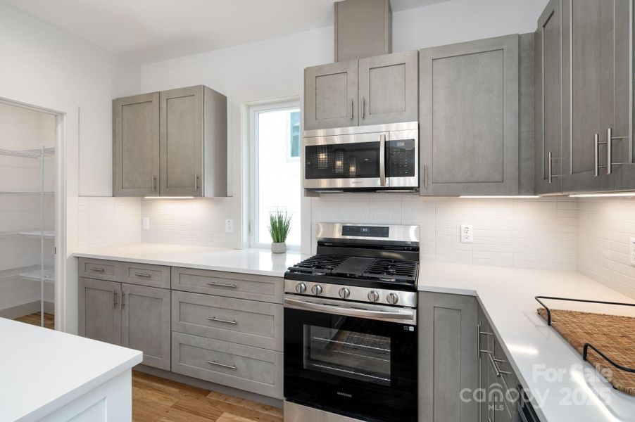 Soft-Close Cabinets and Gorgeous Tile Backsplash Soft-Close Cabinets and Gorgeous Tile Backsplash