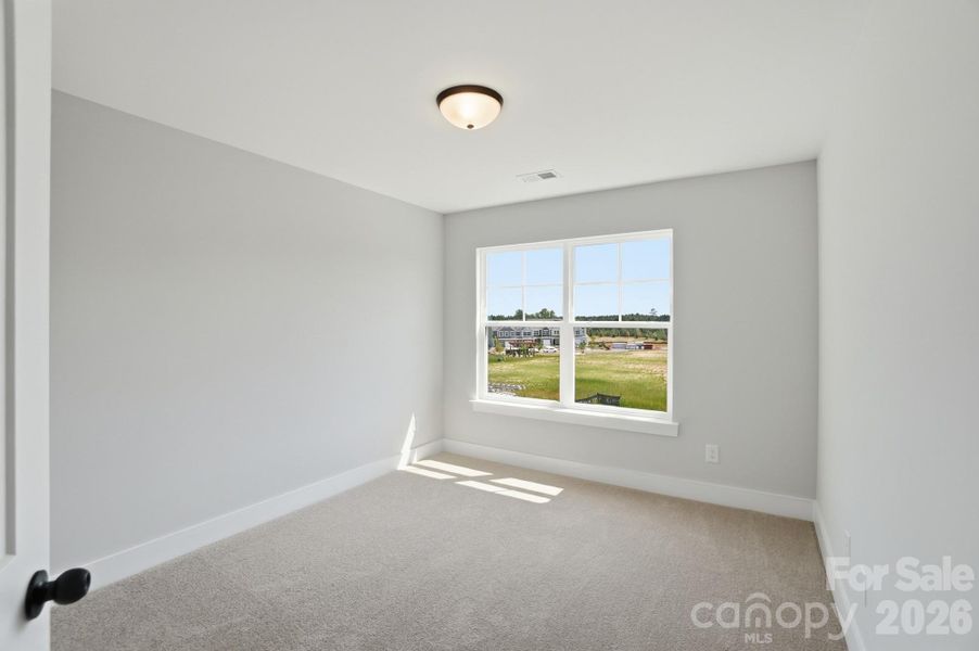 Spacious, unfurnished interior of a new home in Blythe Mill Townhomes, Waxhaw (Image 36).