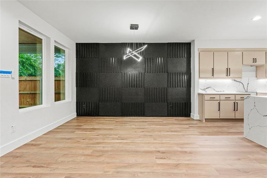 Unfurnished dining area with light wood-type flooring Unfurnished dining area with light wood-type flooring