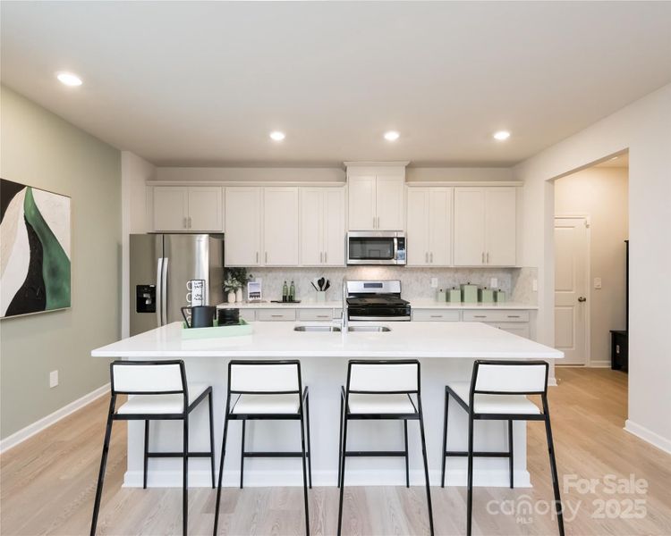 Photo is not of the actual home, but is an inspirational photo of builder’s model home and may depict options, furnishings, and/or decorator features that are not included