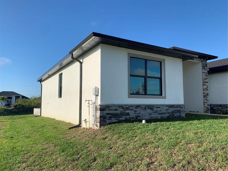 Exterior details and patio area of a home in , Port Charlotte (Image 13).