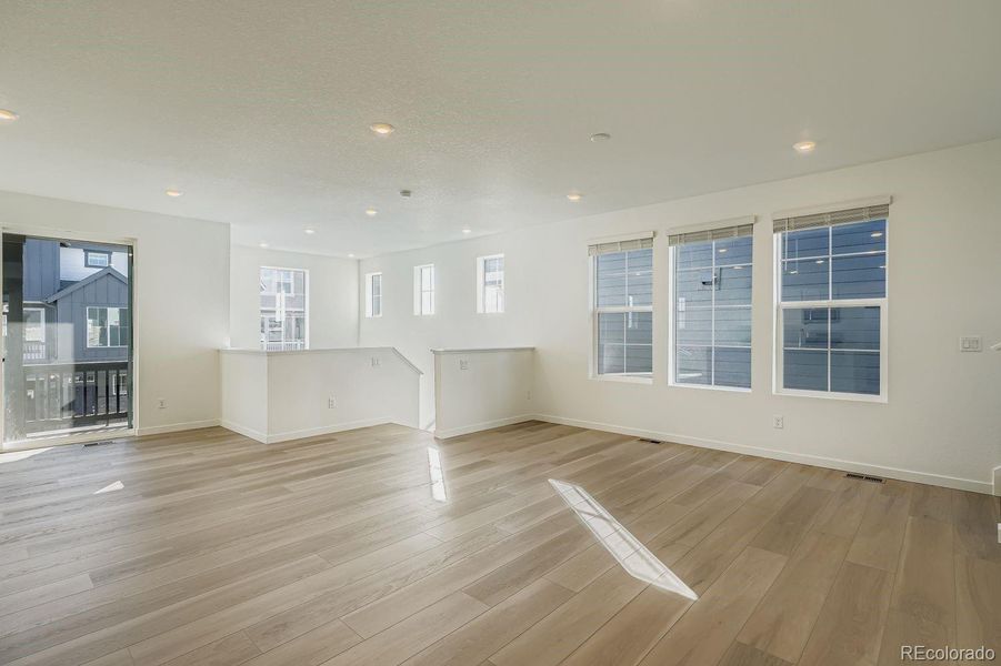 Spacious, unfurnished interior of a new home in Parterre: The Skyline Collection, Thornton (Image 14).