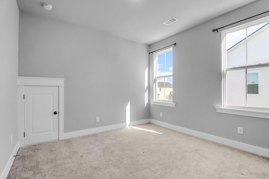 Spacious, unfurnished interior of a new home in Carnes Crossroads: Row Collection, Summerville (Image 30). Spacious, unfurnished interior of a new home in Carnes Crossroads: Row Collection, Summerville (Image 30).