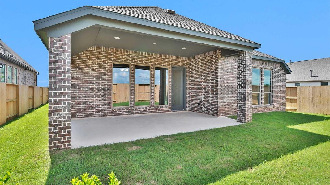 Exterior details and patio area of a home in Meridiana, Manvel (Image 2). Exterior details and patio area of a home in Meridiana, Manvel (Image 2).