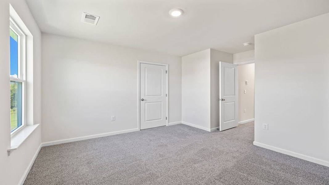 Spacious, unfurnished interior of a new home in Paddock Point, Roebuck (Image 20). Spacious, unfurnished interior of a new home in Paddock Point, Roebuck (Image 20).