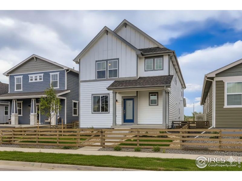 Front exterior of a new home in Waterfield - Single Family Homes, Fort Collins, CO, highlighting curb appeal (Image 2). Front exterior of a new home in Waterfield - Single Family Homes, Fort Collins, CO, highlighting curb appeal (Image 2).