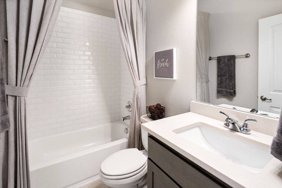 Representative furnished interior of a home built from the Brazos by UnionMain Homes in Elevon, Lavon (Image 25).