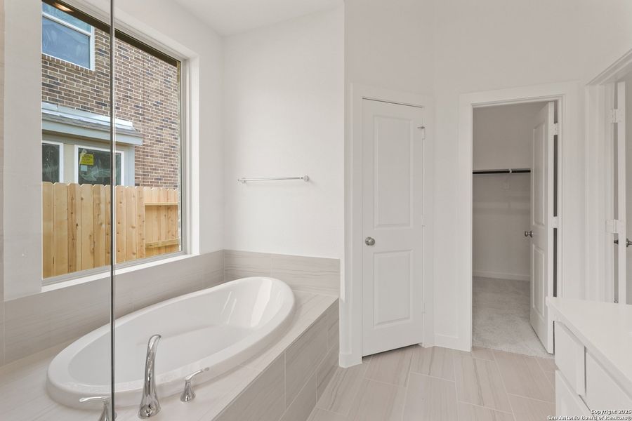 Furnished interior view inside a new home in Prominence, San Antonio (Image 12).