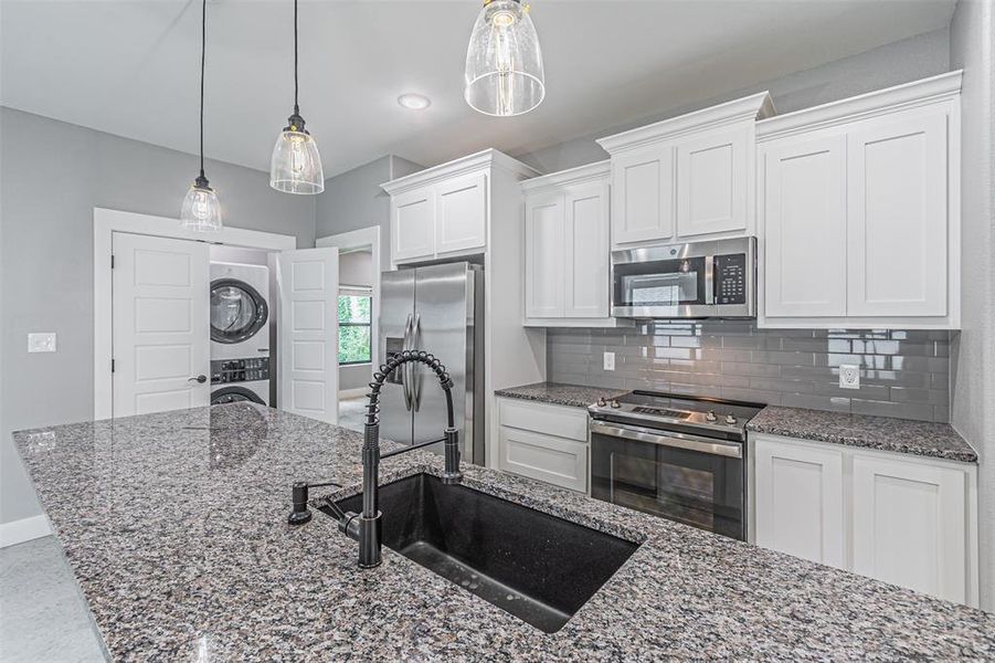 Furnished interior view inside a new home in , Denison (Image 5).