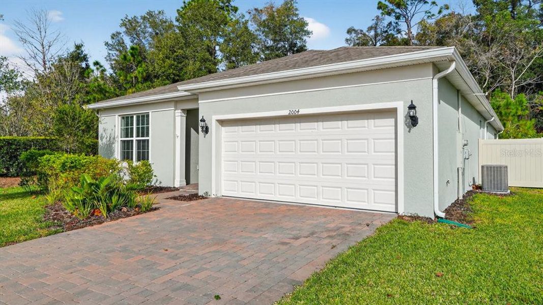 Exterior details and patio area of a home in Canopy Terrace, Deland (Image 2). Exterior details and patio area of a home in Canopy Terrace, Deland (Image 2).