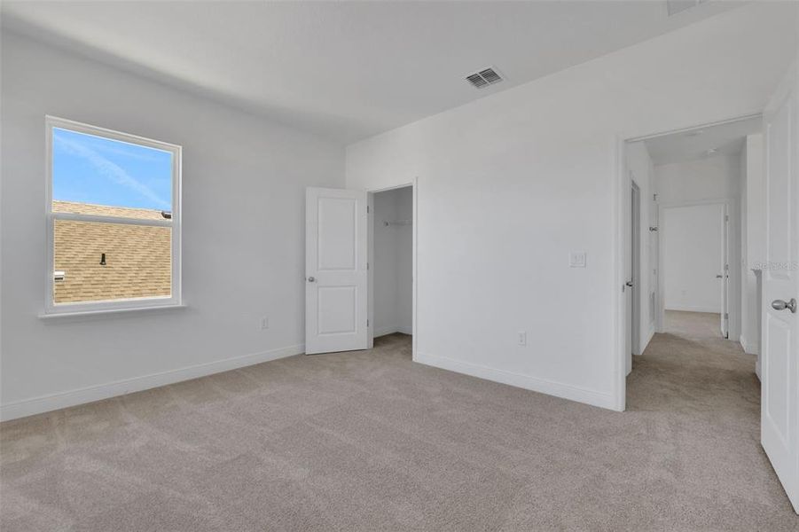 Spacious, unfurnished interior of a new home in Serenade at Ovation, Winter Garden (Image 17). Spacious, unfurnished interior of a new home in Serenade at Ovation, Winter Garden (Image 17).