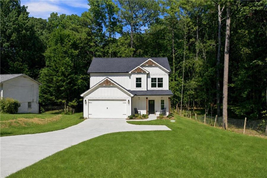 Front exterior of a new home in , Cumming, GA, highlighting curb appeal (Image 30).