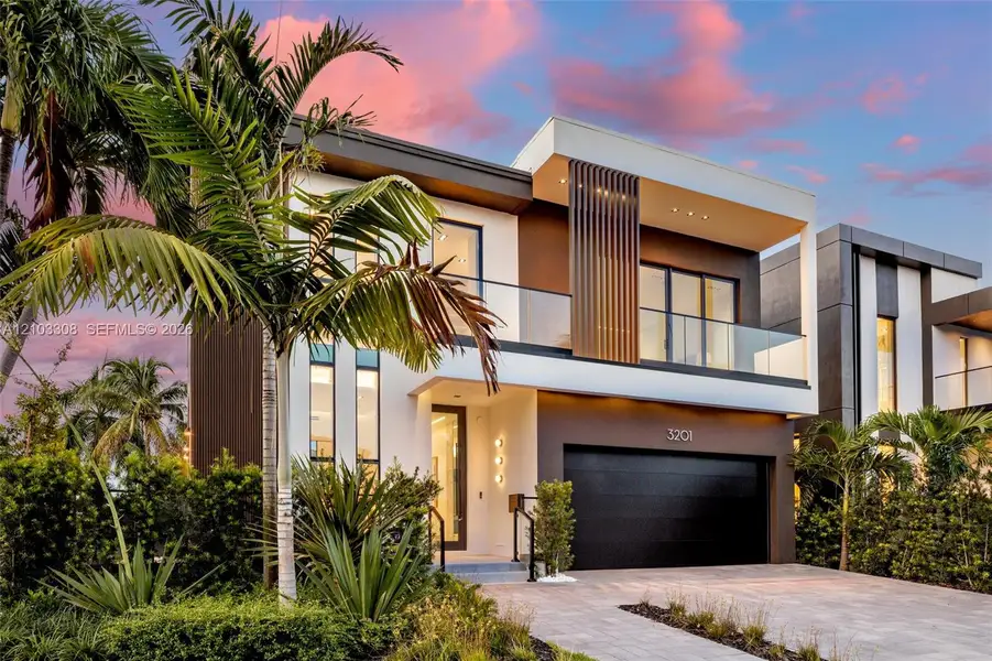 Front exterior of a new home in , Fort Lauderdale, FL, highlighting curb appeal (Image 1). Front exterior of a new home in , Fort Lauderdale, FL, highlighting curb appeal (Image 1).