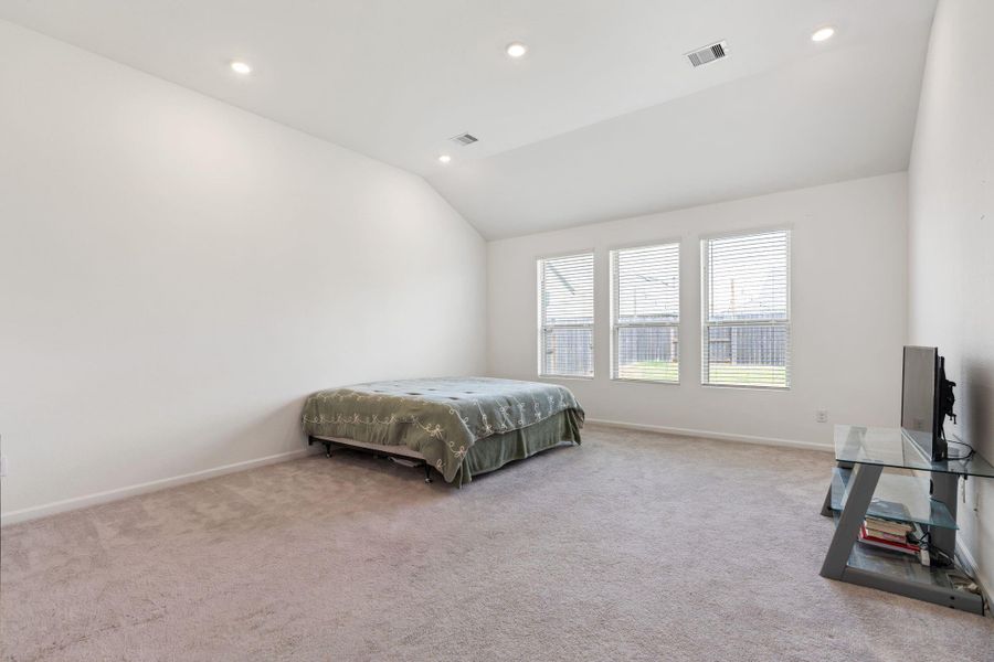 Furnished interior view inside a new home in Sunterra, Katy (Image 11).