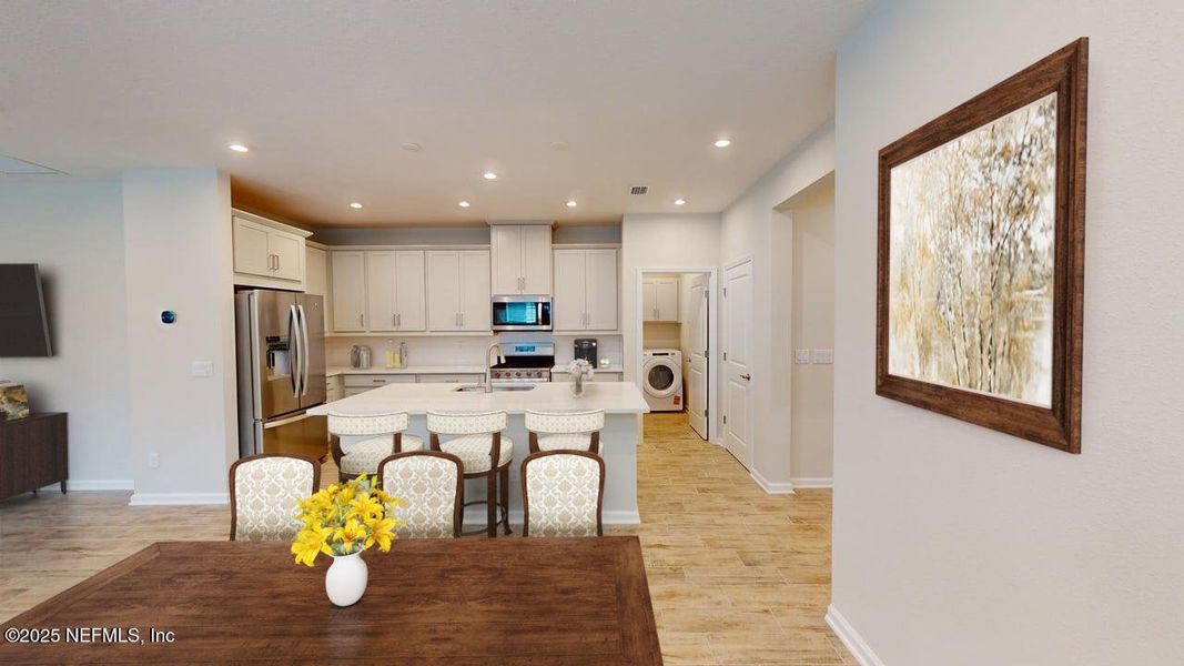 Furnished interior view inside a new home in RiverTown - WaterSong, St. Johns (Image 4). Furnished interior view inside a new home in RiverTown - WaterSong, St. Johns (Image 4).