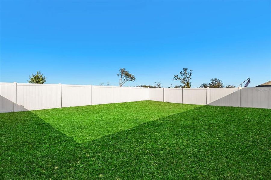 Exterior details and patio area of a home in Pine Creek, Spring Hill (Image 21).