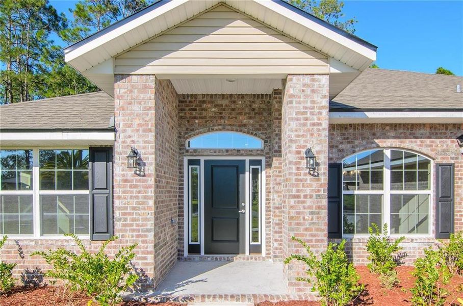 Exterior details and patio area of a home in Palm Coast, Palm Coast (Image 3). Exterior details and patio area of a home in Palm Coast, Palm Coast (Image 3).
