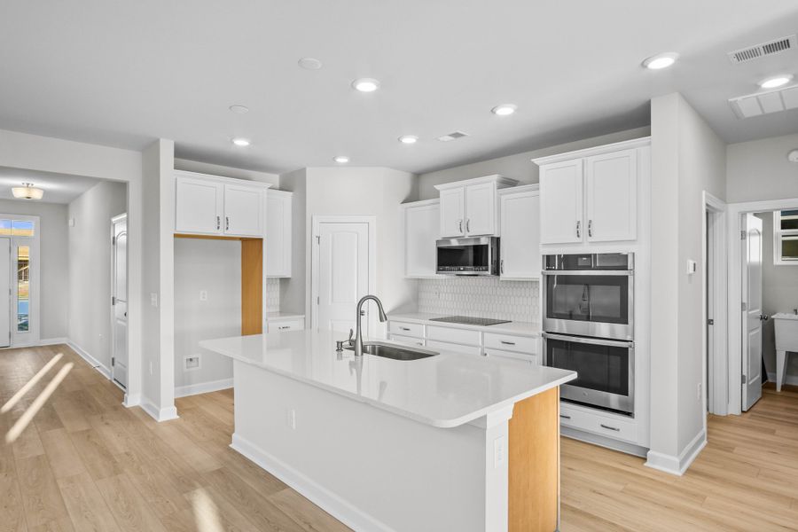 Furnished interior view inside a new home in Coastal Club of the Carolinas, Calabash (Image 6).