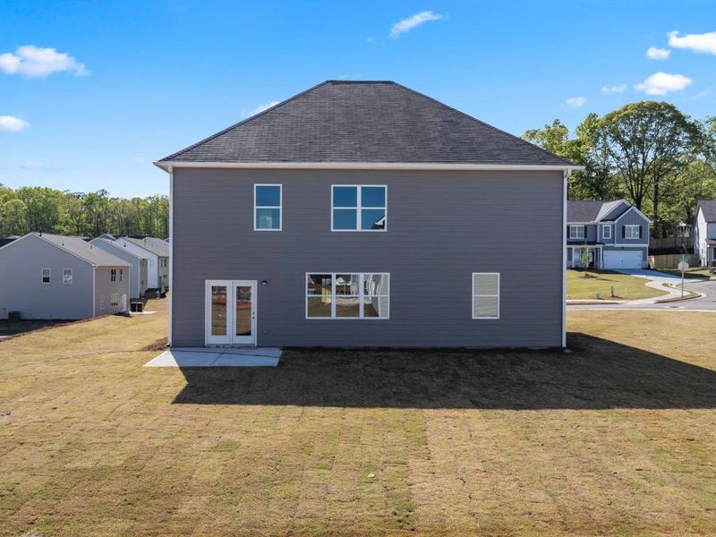 Front exterior of a new home in Thompson Ridge, Dallas, GA, highlighting curb appeal (Image 21).
