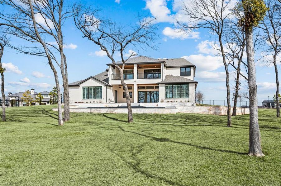 Exterior details and patio area of a home in The Resort on Eagle Mt. Lake, Fort Worth (Image 3).