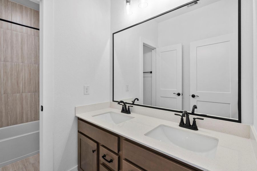 Furnished interior view inside a new home in Wood Leaf Reserve, Tomball (Image 14).