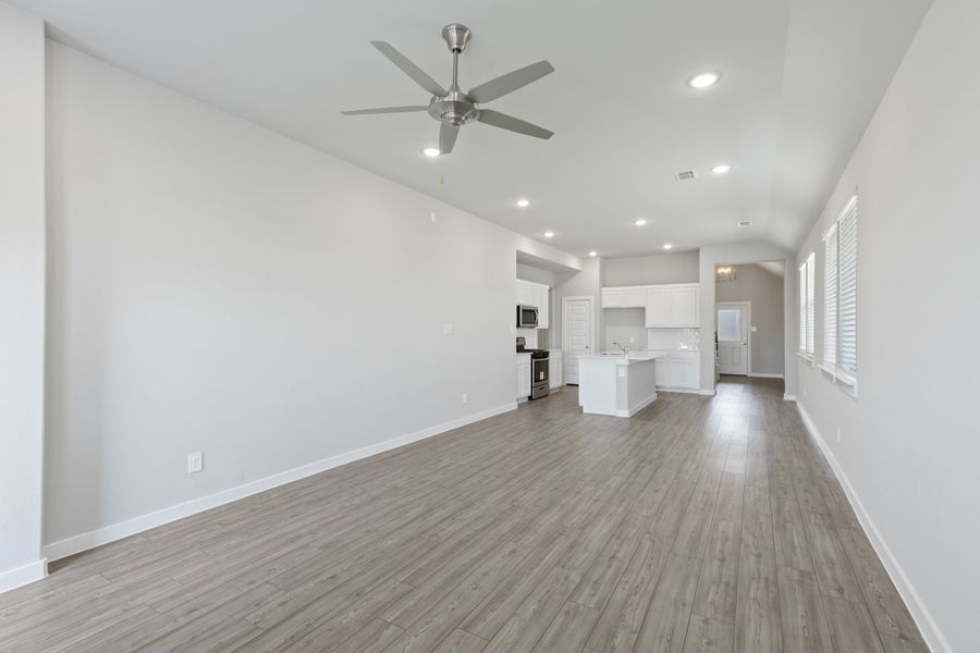 Open living space in the Elm home plan by Trophy Signature Homes – REPRESENTATIVE PHOTO