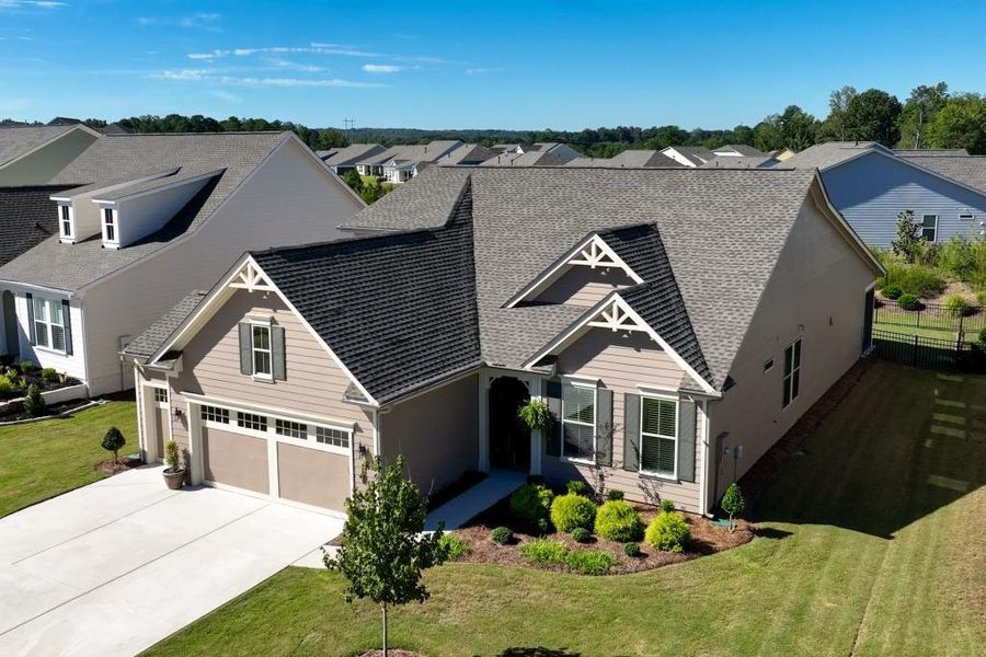 Front exterior of a new home in , Hoschton, GA, highlighting curb appeal (Image 25).