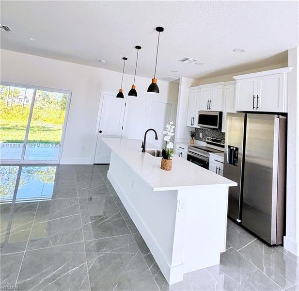 Furnished interior view inside a new home in , Lehigh Acres (Image 5).