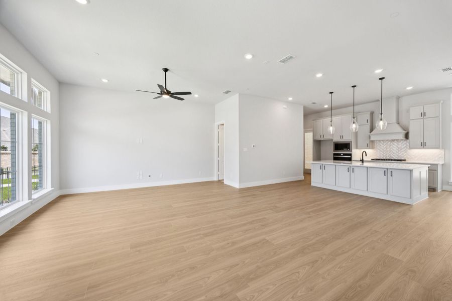Representative unfurnished interior of a home built from the Washington by Centre Living Homes in Newman Village Townhomes, Frisco (Image 13).