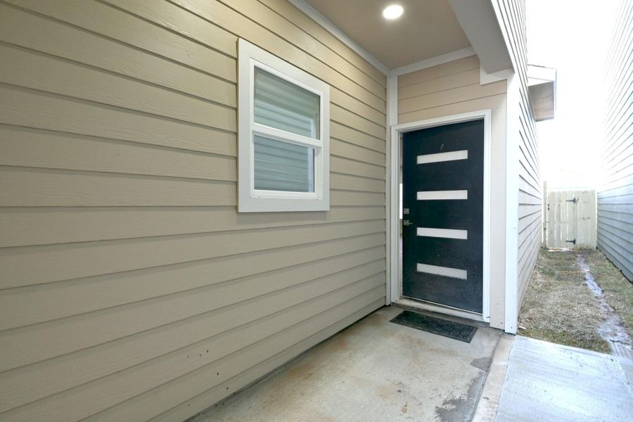 Exterior details and patio area of a home in , Houston (Image 3).