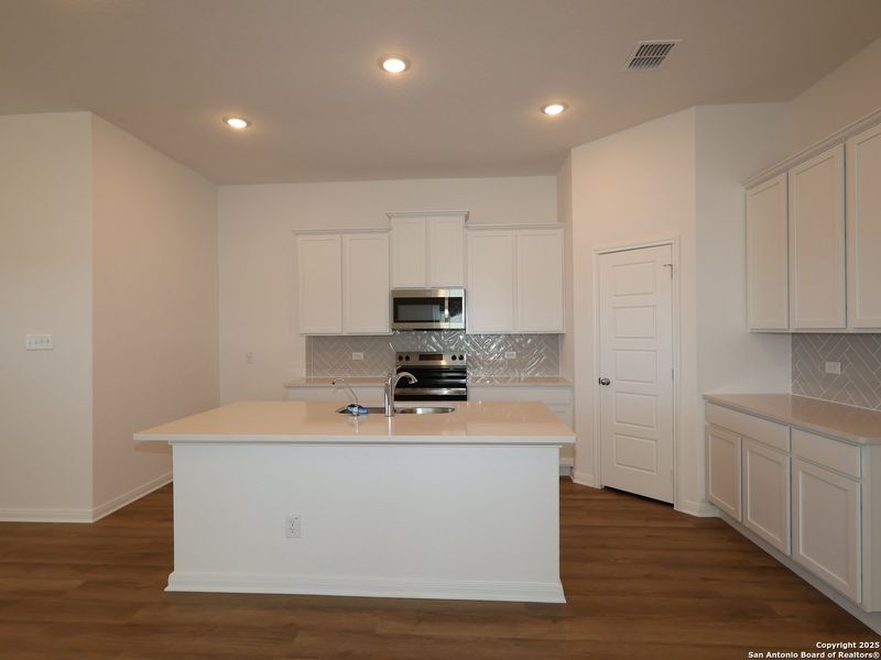 Furnished interior view inside a new home in Greenspoint Heights, Seguin (Image 6).