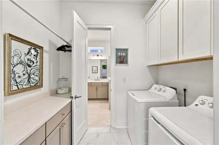Furnished interior view inside a new home in The Retreat at Sterling on the Lake 48', Flowery Branch (Image 17).