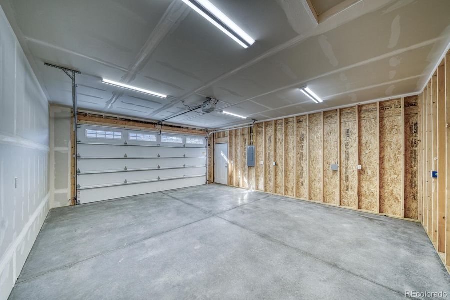 Two car garage with exterior access door Two car garage with exterior access door