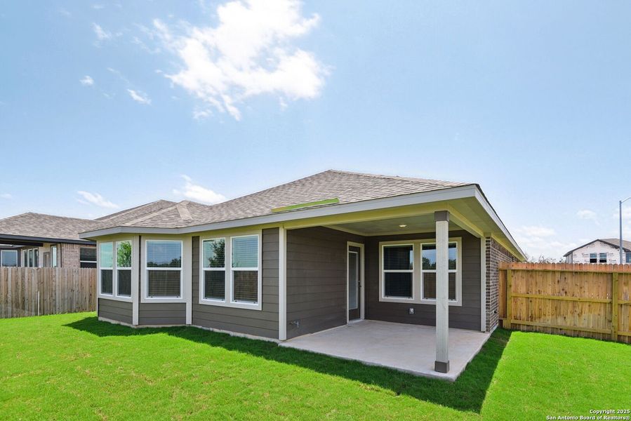 Front exterior of a new home in Carmel Ranch, Schertz, TX, highlighting curb appeal (Image 22). Front exterior of a new home in Carmel Ranch, Schertz, TX, highlighting curb appeal (Image 22).