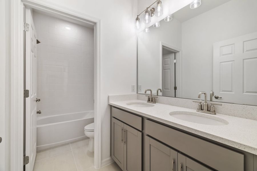 Furnished interior view inside a new home in Trinity Gardens, Deland (Image 5).