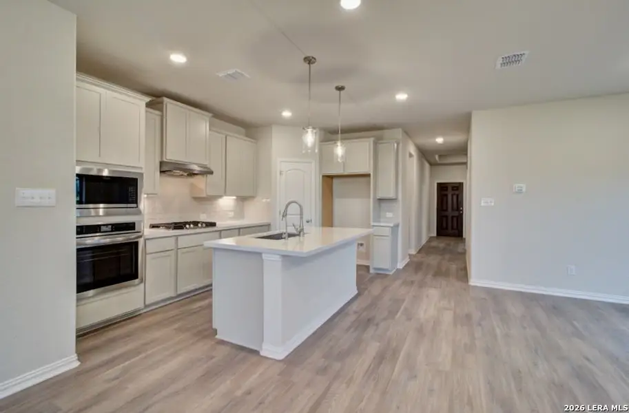 Furnished interior view inside a new home in Meyer Ranch - Enclave, New Braunfels (Image 10).