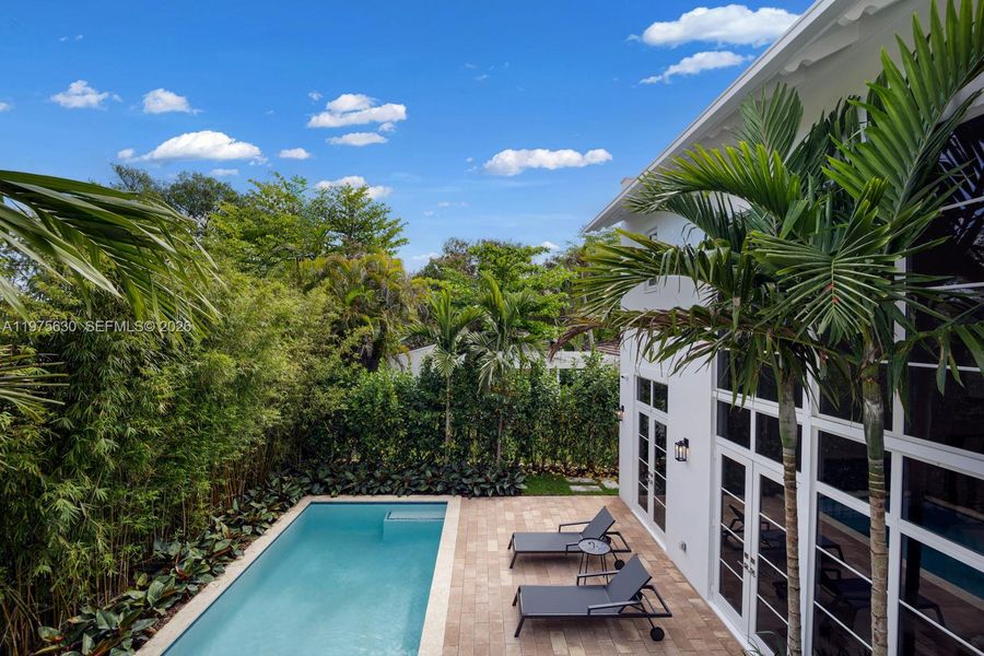 Exterior details and patio area of a home in , Coral Gables (Image 25).