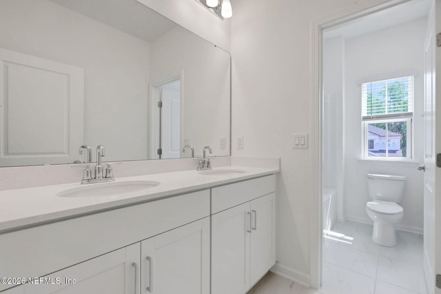 Furnished interior view inside a new home in TrailMark, St. Augustine (Image 6).