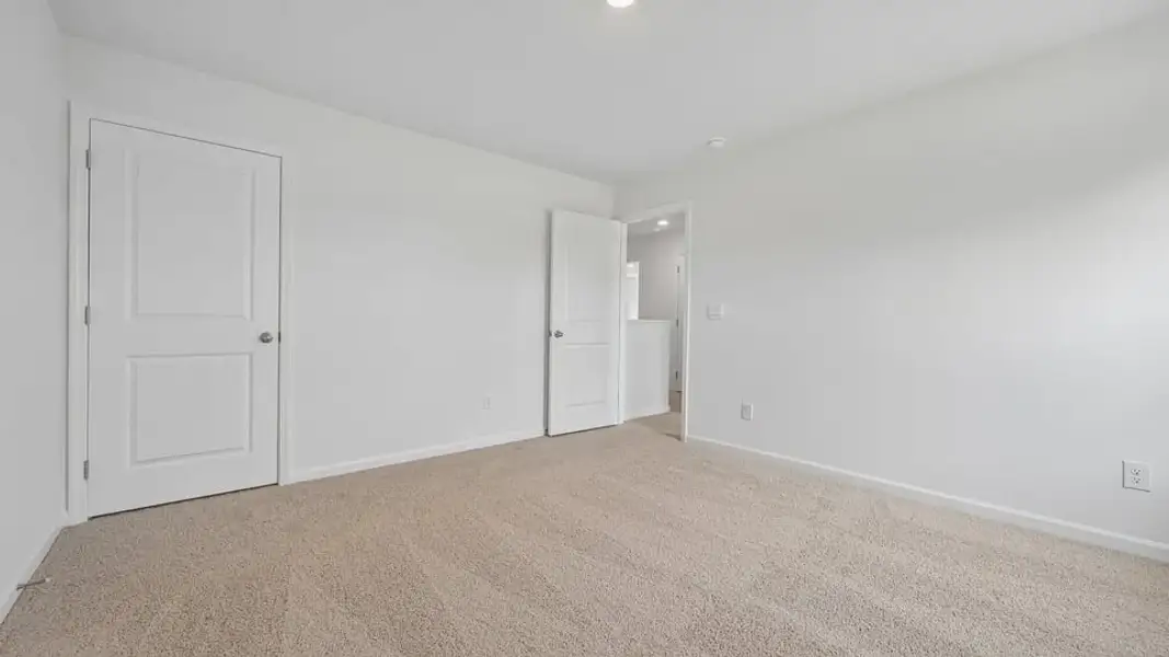 Spacious, unfurnished interior of a new home in Mangum Farms, Stem (Image 29).