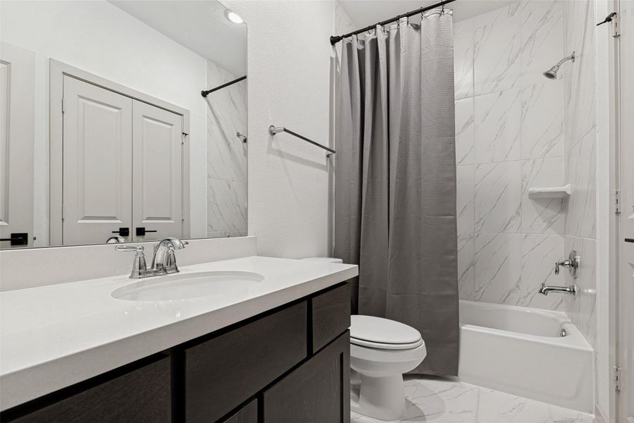 Furnished interior view inside a new home in , Conroe (Image 34).