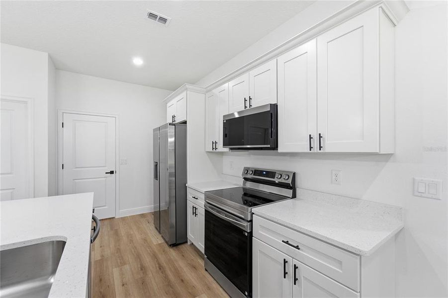 Furnished interior view inside a new home in , Ocala (Image 10).