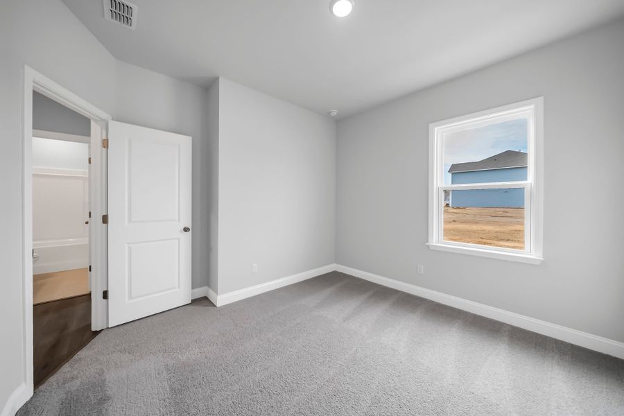 Spacious, unfurnished interior of a new home in Monroe Preserve, Chapin (Image 18).