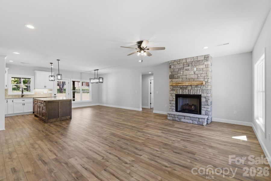 Luxury vinyl plank flooring throughout, with no carpet