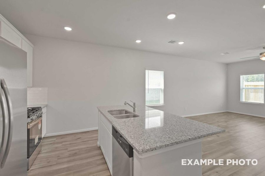 Furnished interior view inside a new home in Spring Branch Crossing, Conroe (Image 2).